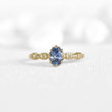 Floral Ring With 0.85c Oval Blue Sapphire