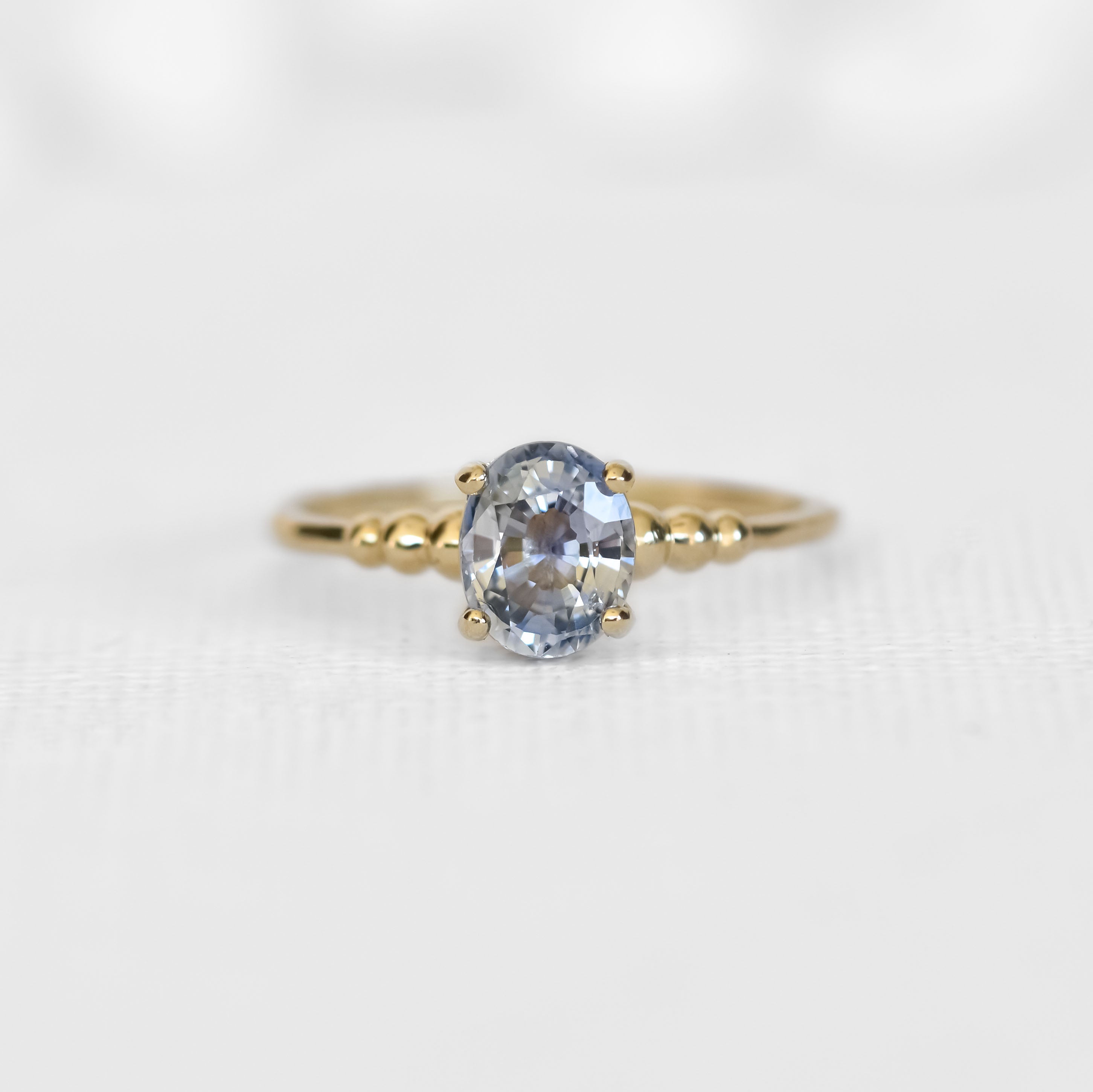 Gradient Ball Engagement Ring With Light Blue Sapphire