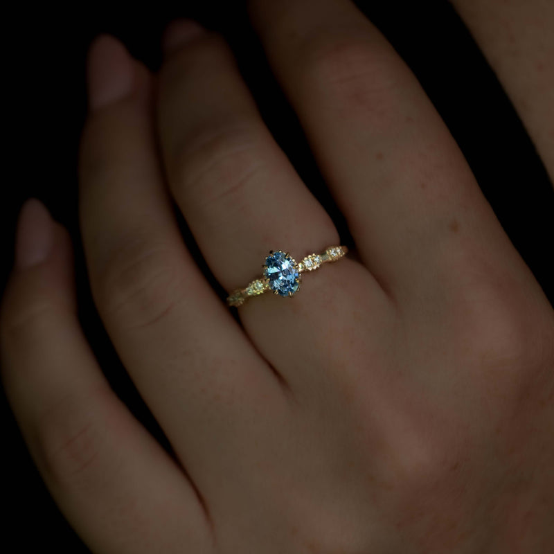 Floral Ring With 0.85c Oval Blue Sapphire