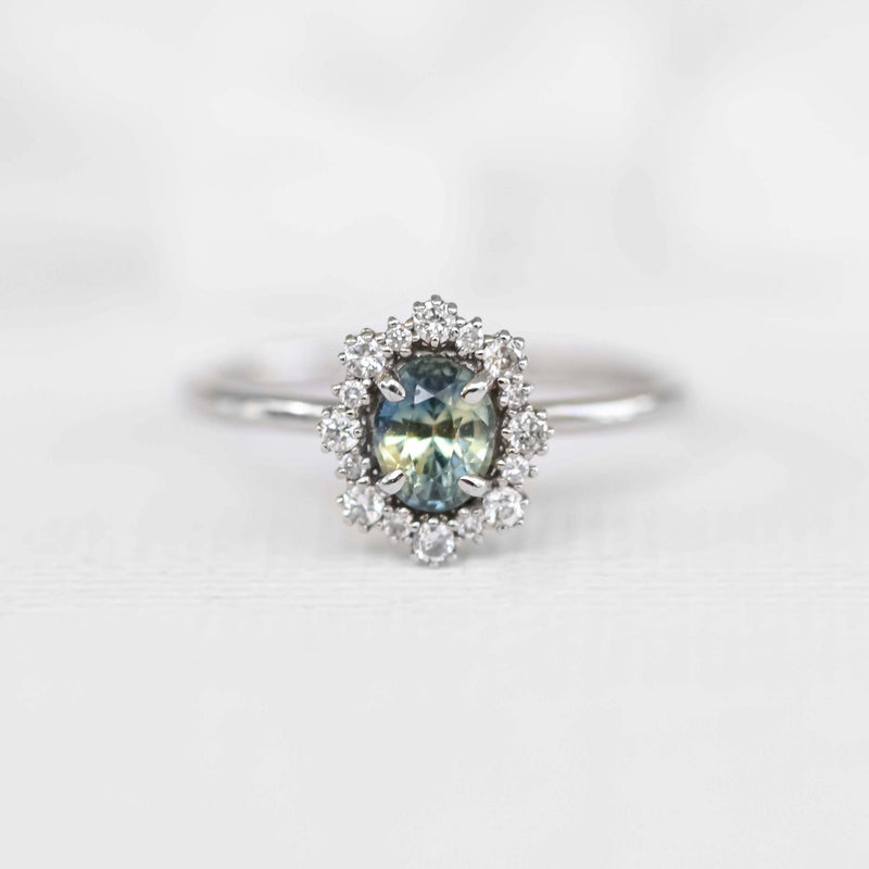 Yellowish Blue Oval Sapphire Halo Ring